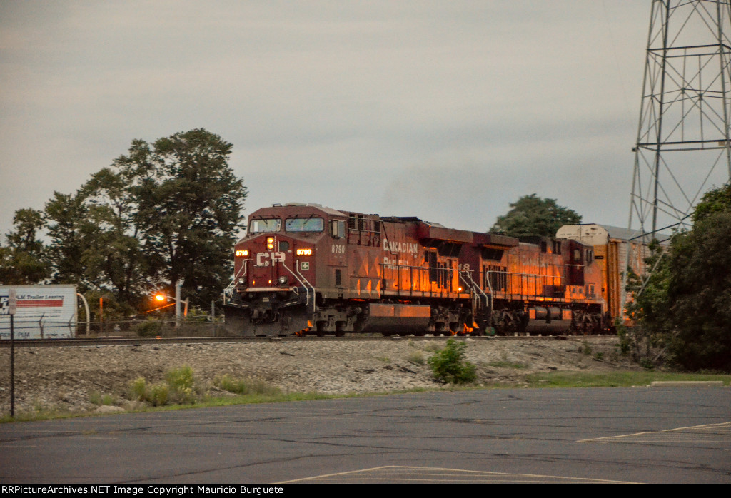 CP ES44AC & AC44CW Locomotives leading a train